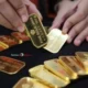 Emas Antam Melonjak Rp14.000 ke Rp1,938 Juta per Gram