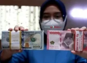 Rupiah Menguat Tipis ke Rp16.300 per Dolar AS, Pasar Tunggu Sinyal The Fed